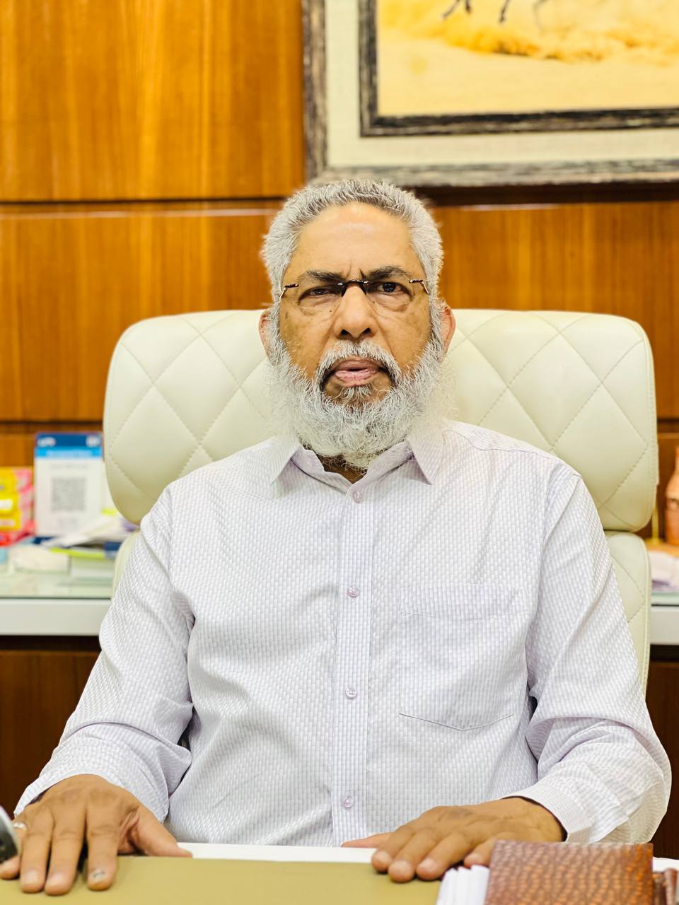 Mr. Mohsin Balsara, Director and Chairman